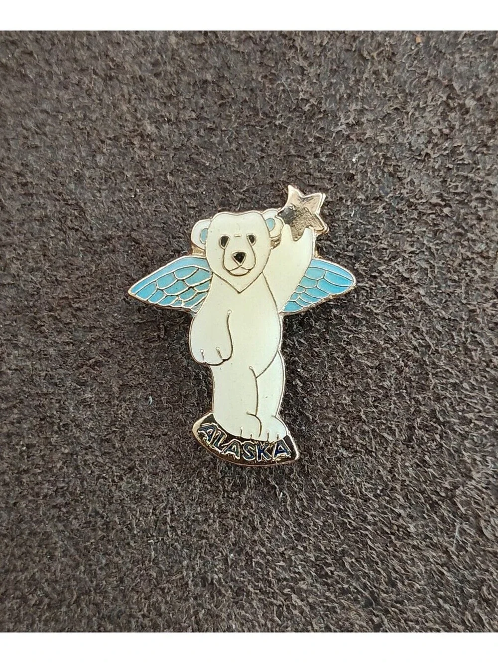 1980s Alaskan Polar Bear Guardian Angel Gold Tone Enamel Pin.